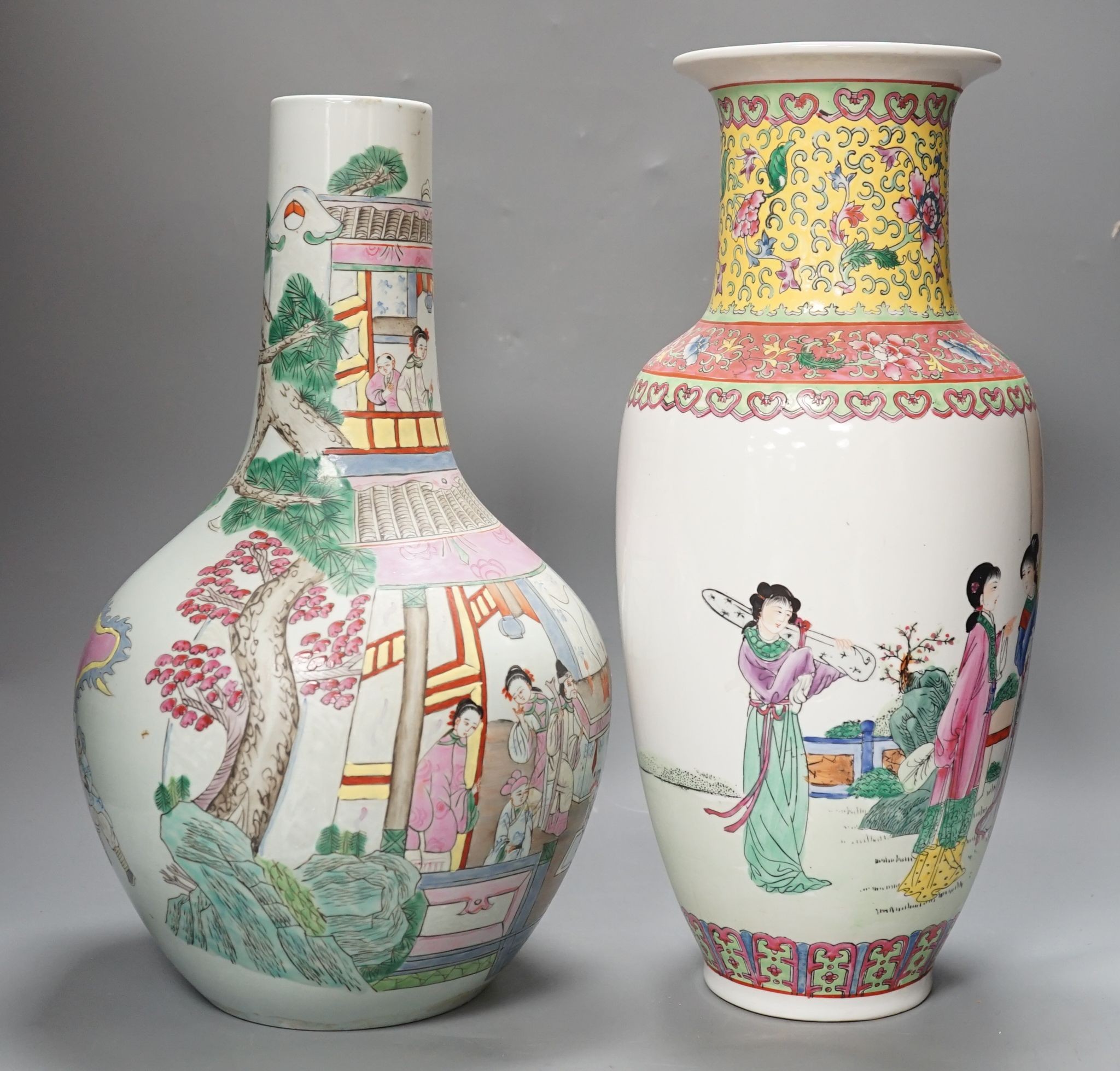 Two Chinese famille rose vases, tallest 42 cms high.